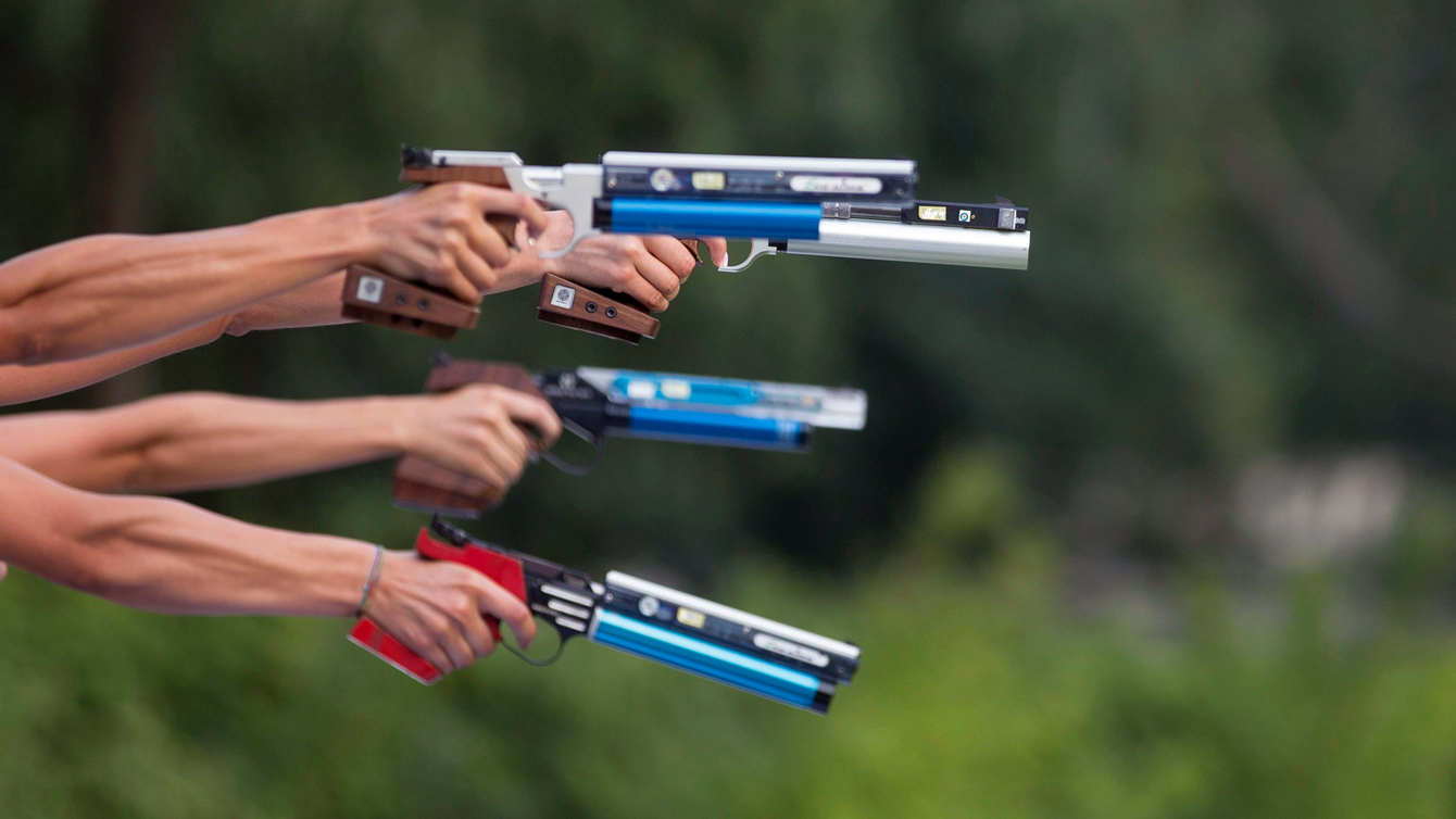 Shooting and running are combined in modern pentathlon. (AP Photo/Axel Schmidt)