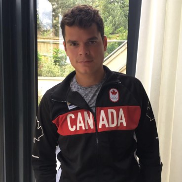 Milos Raonic sports his Team Canada nomination jacket at Wimbledon after being named to the Olympic Team on June 30, 2016.