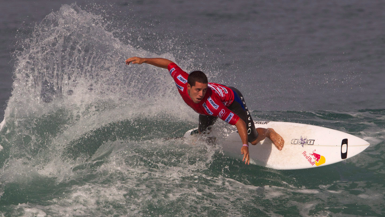 Brazil's Adriano de Souza competes in the round one of the Billabong Rio Pro men's surfing competition in Rio de Janeiro, Brazil, Wednesday, May 9, 2012. (AP Photo/Silvia Izquierdo)