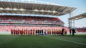 Canada (in red) and Brazil line up ahead of their international friendly