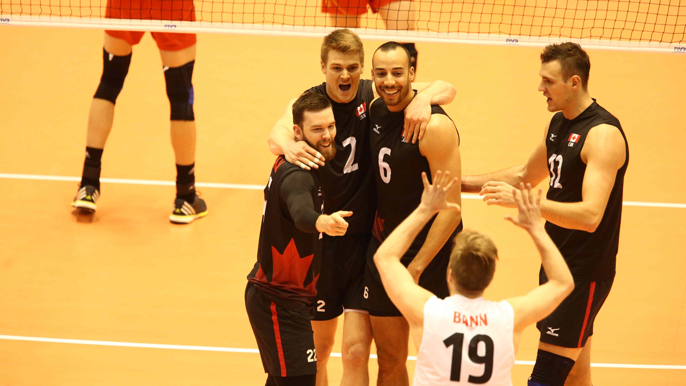 Canada's men's volleyball team celebrates a point against China at the World Olympic Qualification Tournament in Tokyo on June 5, 2016 (Photo: FIVB)