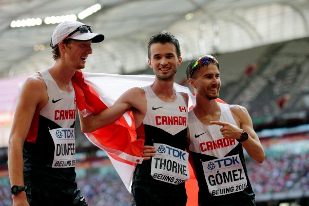 From left, Canada's Evan Dunfee, Benjamin Thorne and Inaki Gomez after Thorne finished third in the mens 20k race walk final at the World Athletics Championships at the Bird's Nest stadium in Beijing, Sunday, Aug. 23, 2015. (AP Photo/David J. Phillip)