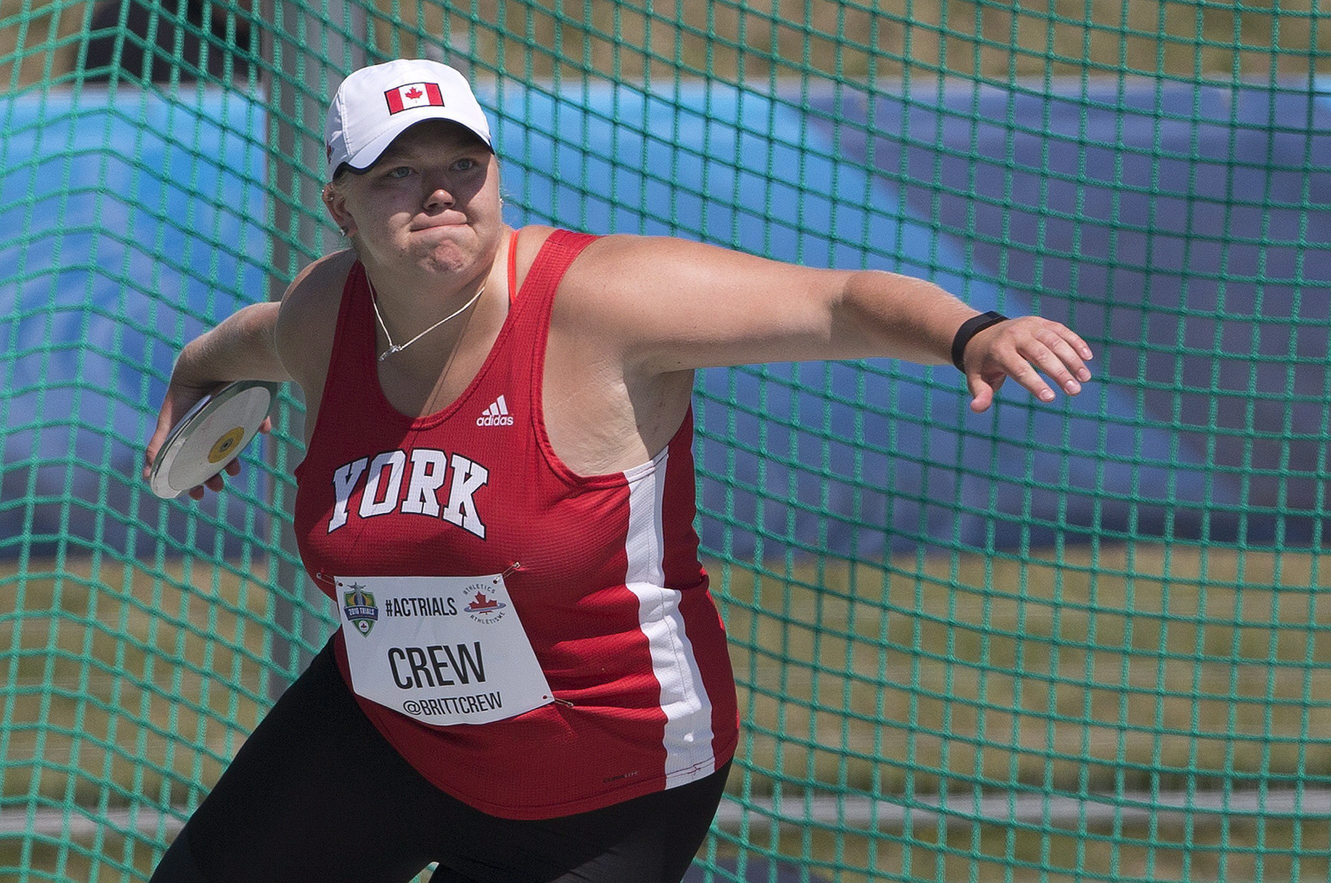 Brittany Crew makes her throw during the senior women's discus final at the Canadian Track and Field Championships and Selection Trials for the 2016 Summer Olympic and Paralympic Games, in Edmonton, Alta., on Friday, July 8, 2016.THE CANADIAN PRESS/Jason Franson
