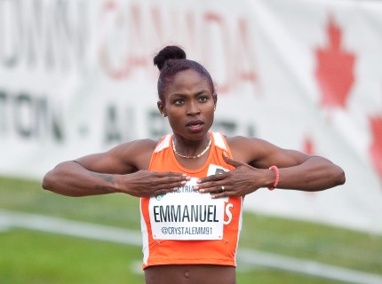 Crystal Emmanuel celebrates her win in the senior women's 200 metre final during the Canadian Track and Field Championships and Selection Trials for the 2016 Summer Olympic and Paralympic Games, in Edmonton, Alta., on Sunday, July 10, 2016. THE CANADIAN PRESS/Dan Riedlhuber