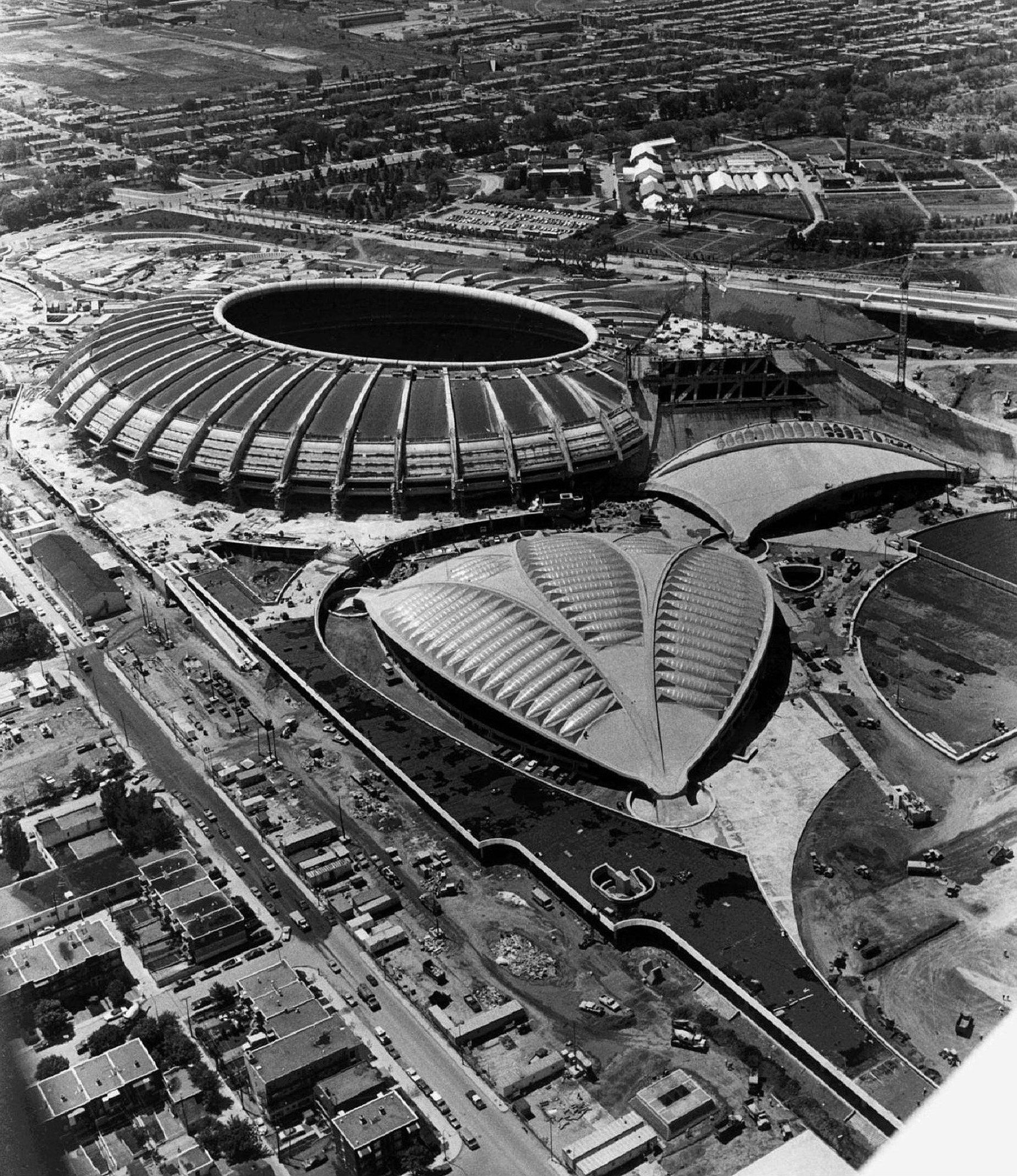 FILE - The Montreal Olympic Stadium and the Olympic Veledrome are shown in this June 1976 photo. It was 30 years ago that the 21st Olympic Games in Montreal opened. They were a huge success despite shocking cost over-runs and construction delays and the fact that there was no gold among the host countrys 11 medals. (CP PICTURE ARCHIVE/stf)