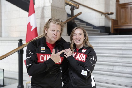 Rosie MacLennan poses with Chef de Mission, Curt Harnett before the Rio 2016 flag bearer announcement on July 21 2016.