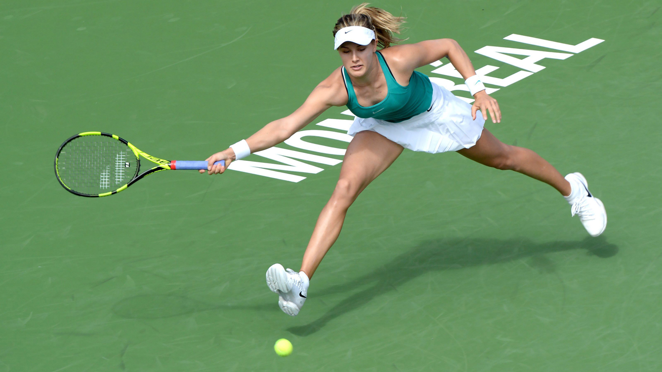 Eugenie Bouchard of Canada returns the ball against Lucie Safarova of the Czech Republic during women's first round Rogers Cup tennis action in Montreal on Tuesday, July 26, 2016. THE CANADIAN PRESS/Paul Chiasson