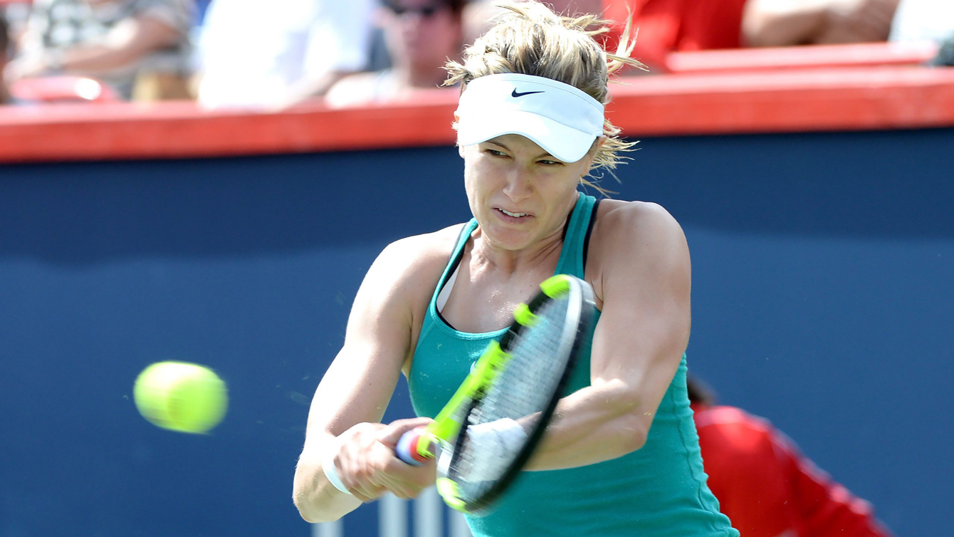 Eugenie Bouchard of Canada returns the ball against Lucie Safarova of the Czech Republic during women's first round Rogers Cup tennis action in Montreal on Tuesday, July 26, 2016. THE CANADIAN PRESS/Paul Chiasson