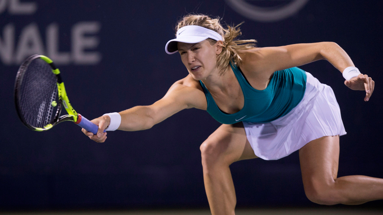 Eugenie Bouchard of Canada returns to Kristina Kucova of Slovakia during third round of play at the Rogers Cup tennis tournament on Thursday July 28, 2016 in Montreal. THE CANADIAN PRESS/Paul Chiasson