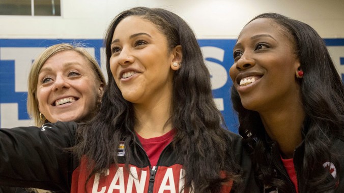 Lizanne Murphy, Natalie Achonwa and Tamara Tatham take a snapchat at the Team Canada Basketball announcement on July 22, 2016. (Tavia Bakowski/COC)