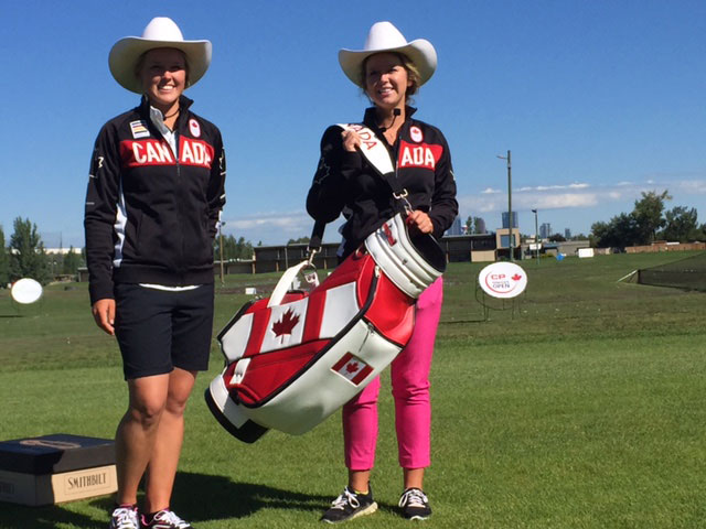 Brooke Henderson (left), and sister, Olympic-bound caddie Brittany Henderson at a simultaneous white hat ceremony in Calgary, Alberta on the day of the Olympic team announcement in Oakville, Ontario, July 19, 2016. 