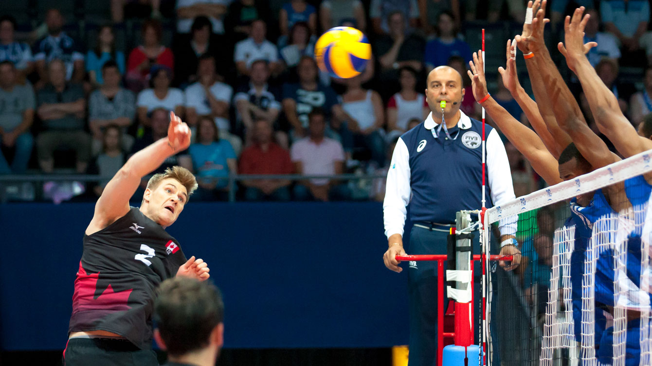 John Gordon Perrin spikes for Canada / Photo: FIVB