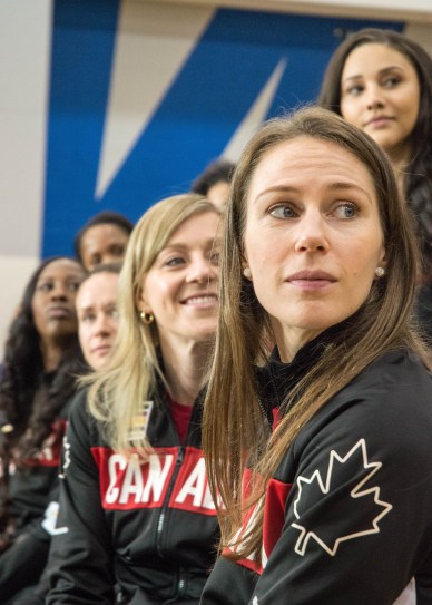 Kim Gaucher and team watch the Ice In Our Veins video during the Team Canada announcement on July 22, 2016. (Tavia Bakowski/COC)