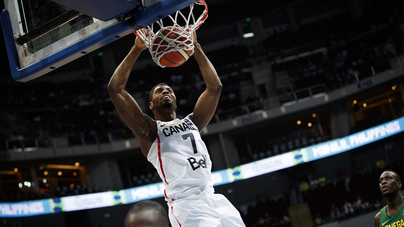 Melvin Ejim completes a dunk against Senegal at the Olympic qualification tournament in Manila on July 6, 2016. (Photo: FIBA)