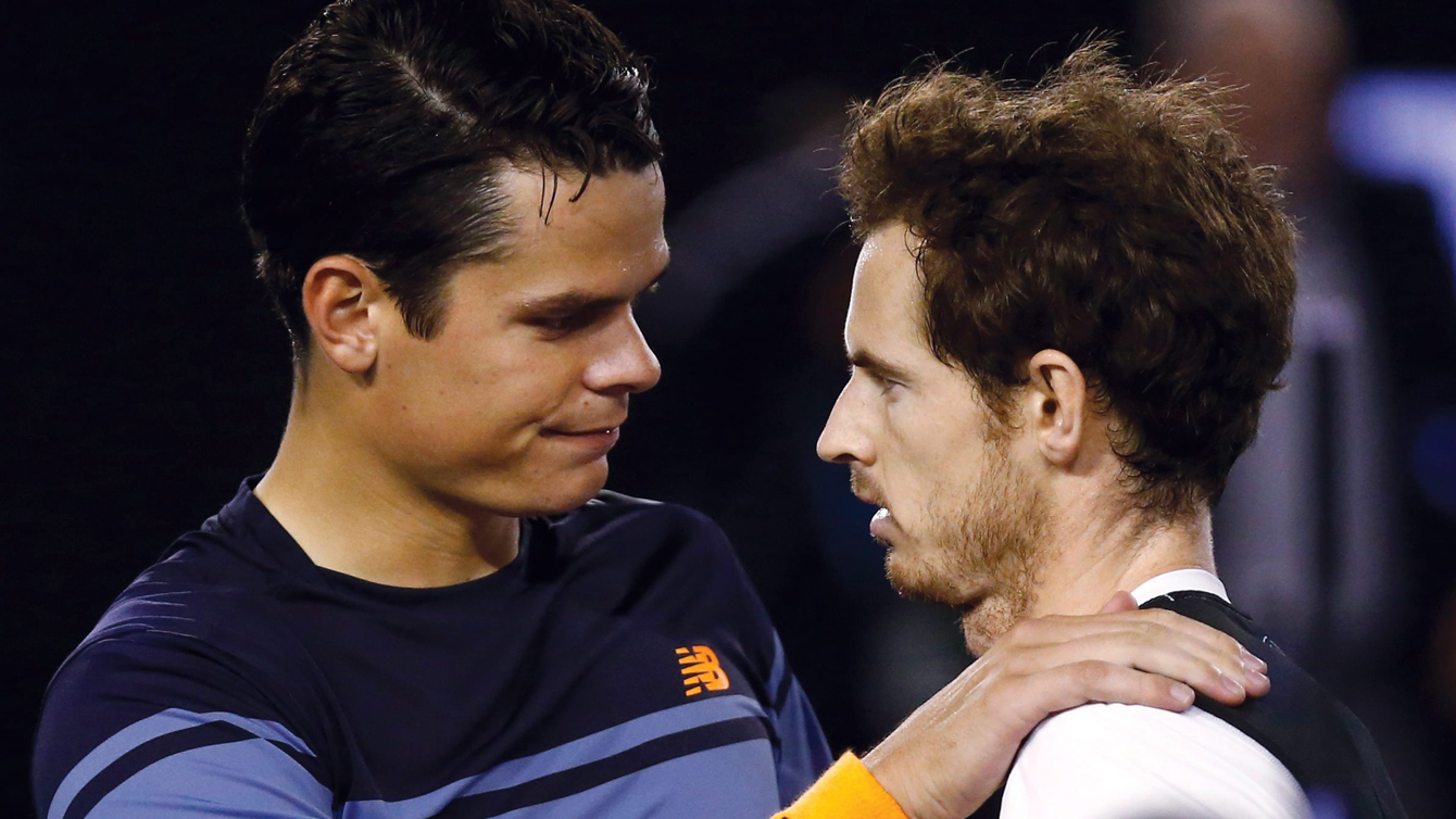 Andy Murray, right, of Britain is congratulated by Milos Raonic of Canada after winning their semifinal at the Australian Open tennis championships in Melbourne, Australia, Friday, Jan. 29, 2016.(AP Photo/Rafiq Maqbool)