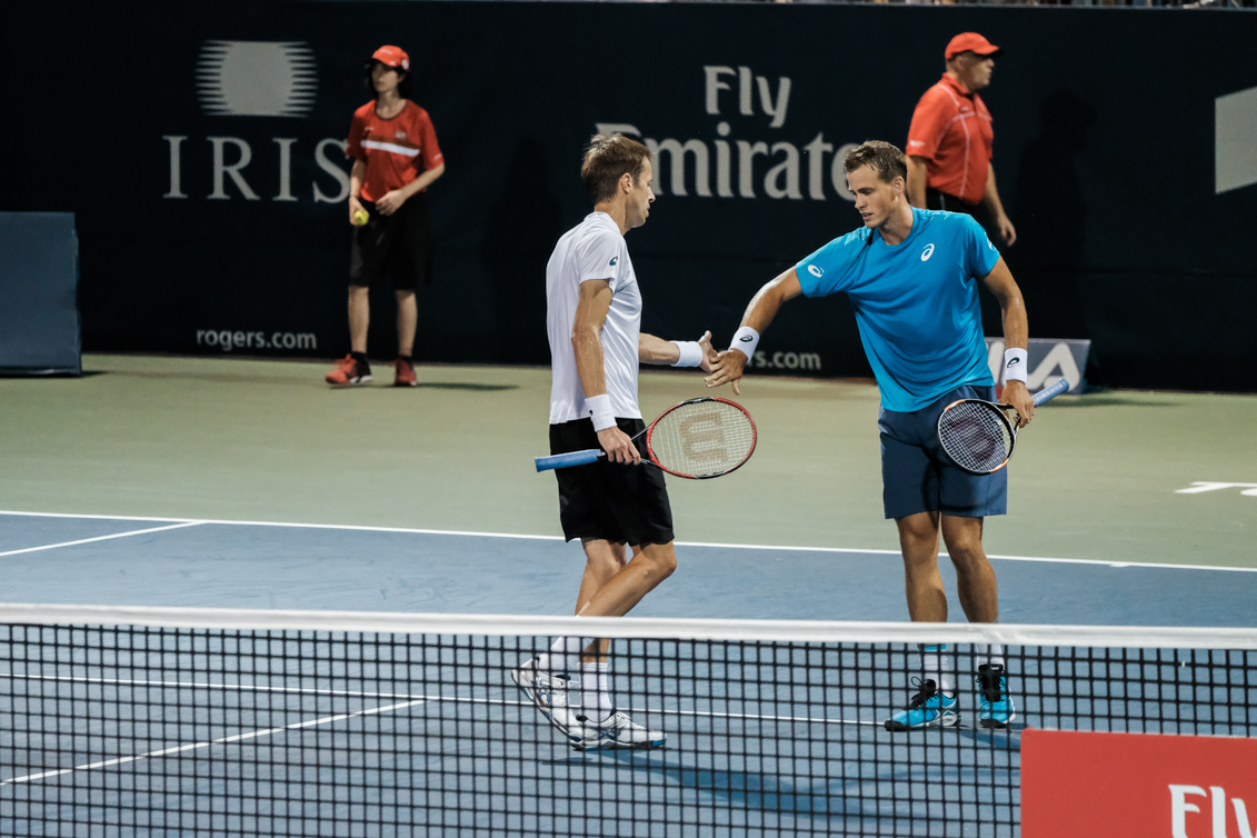 Canada’s Vasek Pospisil and Daniel Nestor play doubles at the Rogers Cup in Toronto on July 28, 2016. (Thomas Skrlj/COC)