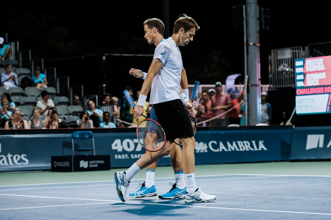 Canada’s Vasek Pospisil and Daniel Nestor play doubles at the Rogers Cup in Toronto on July 28, 2016. (Thomas Skrlj/COC)