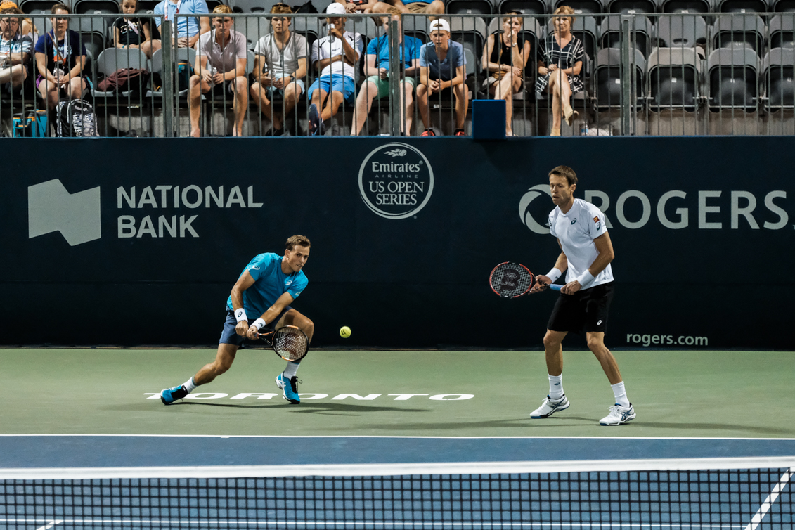 Canada’s Vasek Pospisil and Daniel Nestor play doubles at the Rogers Cup in Toronto on July 28, 2016. (Thomas Skrlj/COC)