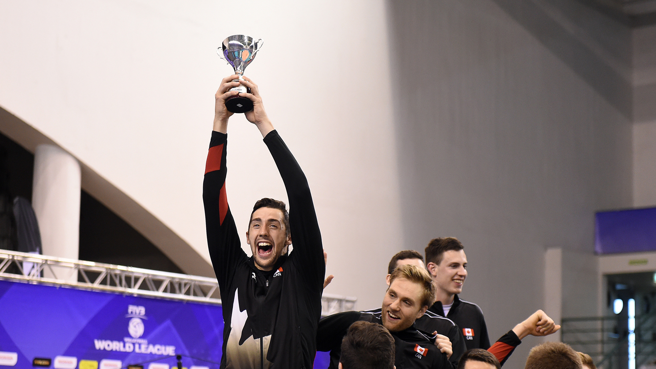Canada's Stephen Timothy Maar celebrating with the FIVB World League Group 2 trophy on July 10, 2016. (Photo: FIVB)