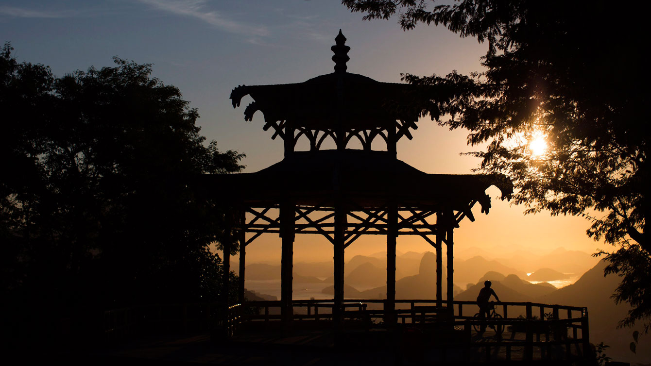 Man cycling at the Vista Chinesa, inside the Parque Nacional da Tijuca, in Rio de Janeiro, Brazil.