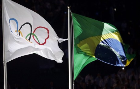 Rio 2016 - Opening Ceremony The Olympic and Brazilian flag fly during the opening ceremony for the 2016 Summer Olympics Friday. AP/Matthias Schrader