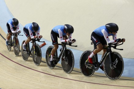 Canada's team compete in the women's team pursuit qualifying at the Rio Olympic Velodrome during the 2016 Summer Olympics in Rio de Janeiro, Brazil, Thursday, Aug. 11, 2016. (AP Photo/Pavel Golovkin)