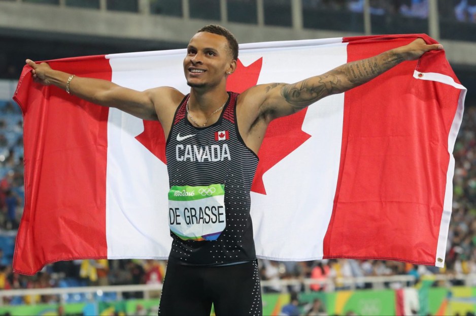 Canada's Andre De Grasse celebrates after winning bronze in the men's 100-meter during the athletics competitions of the 2016 Summer Olympics at the Olympic stadium in Rio de Janeiro, Brazil, Sunday, Aug. 14, 2016. (AP Photo/Lee Jin-man)