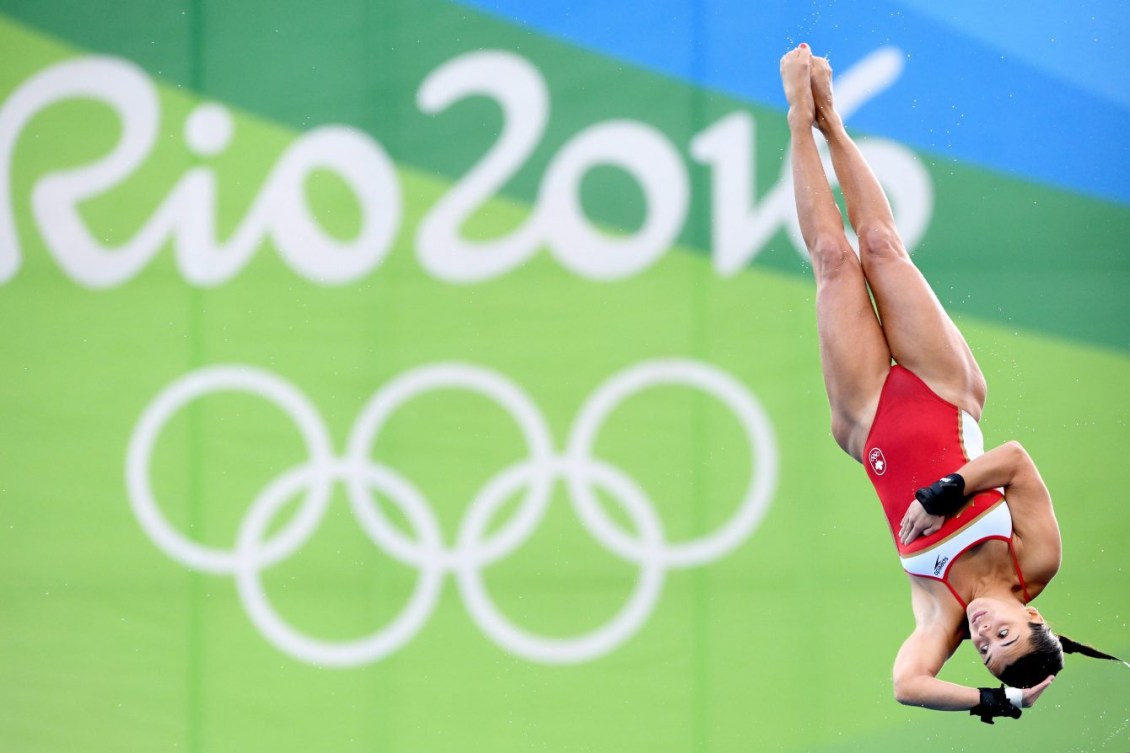 Meaghan Benfeito performs a layout dive 