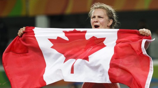 Canada's Erica Elizabeth Wiebe celebrates after winning the gold medal during the women's 75-kg freestyle wrestling competition at the 2016 Summer Olympics in Rio de Janeiro, Brazil, Thursday, Aug. 18, 2016. (AP Photo/Markus Schreiber)