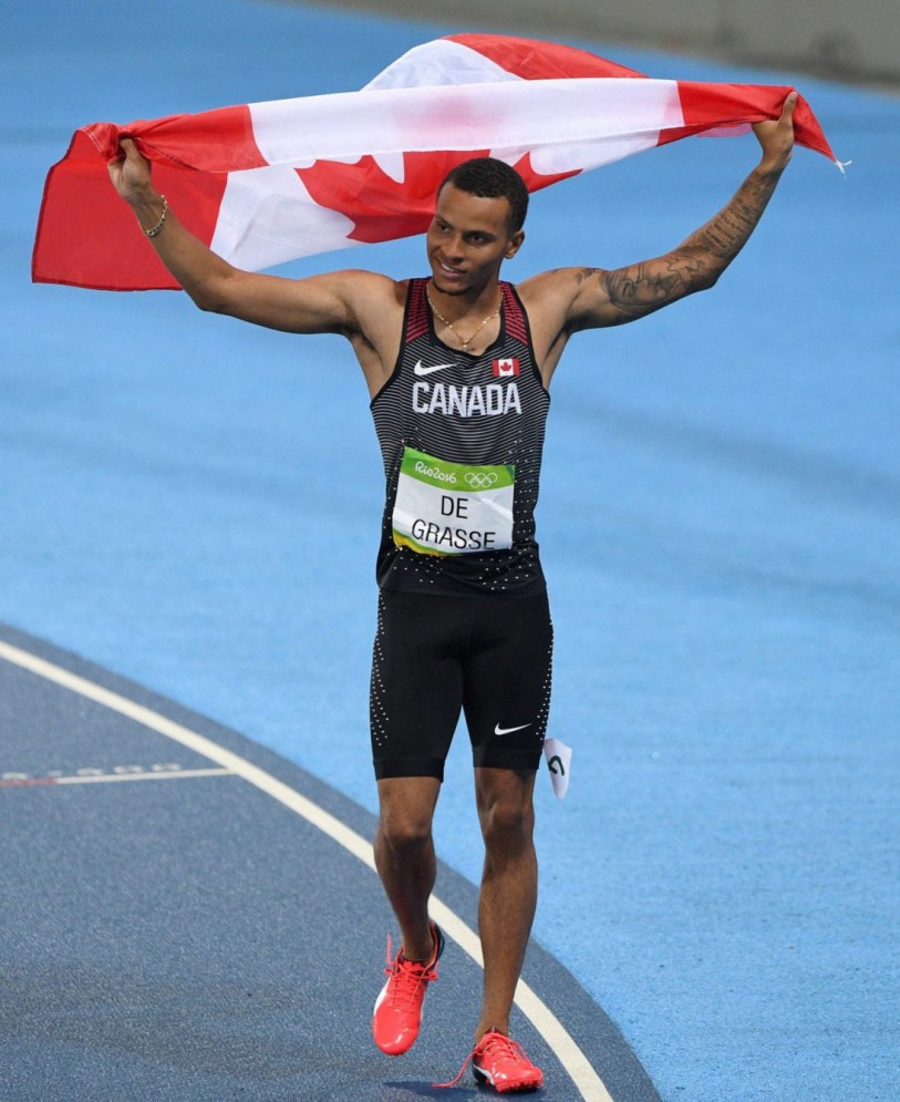 Canada's Andre De Grasse celebrates silver in the men's 200m final at the 2016 Olympic Summer Games in Rio de Janeiro, Brazil on Thursday, Aug. 18, 2016. THE CANADIAN PRESS/Sean Kilpatrick