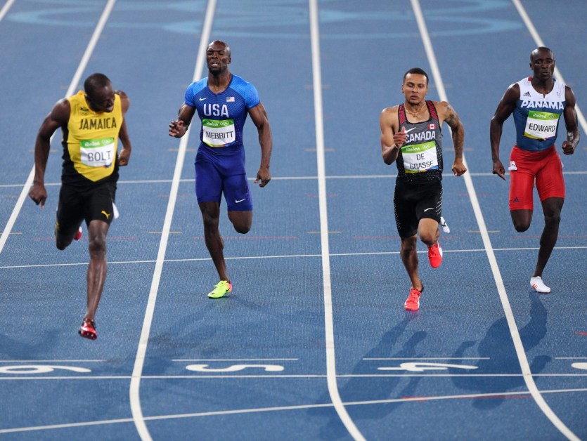 Panama's Alonso Edward, right to left, Canada's Andre De Grasse, United States Lashawn Merritt and Jamaica's Usain Bolt race the men's 200m final at the 2016 Olympic Summer Games in Rio de Janeiro, Brazil on Thursday, Aug. 18, 2016. THE CANADIAN PRESS/Sean Kilpatrick