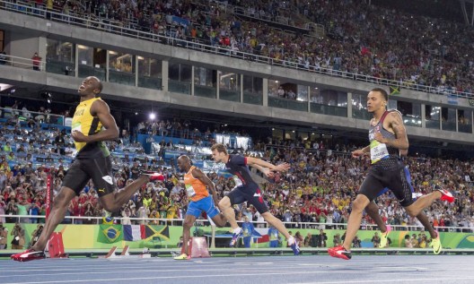 Jamaica's Usain Bolt, left, celebrates his gold medal performance as Canada's Andre De Grasse, right, follows for silver in the men's 200-metre at the Olympic games in Rio de Janeiro, Brazil, Thursday August 18, 2016. THE CANADIAN PRESS/Frank Gunn