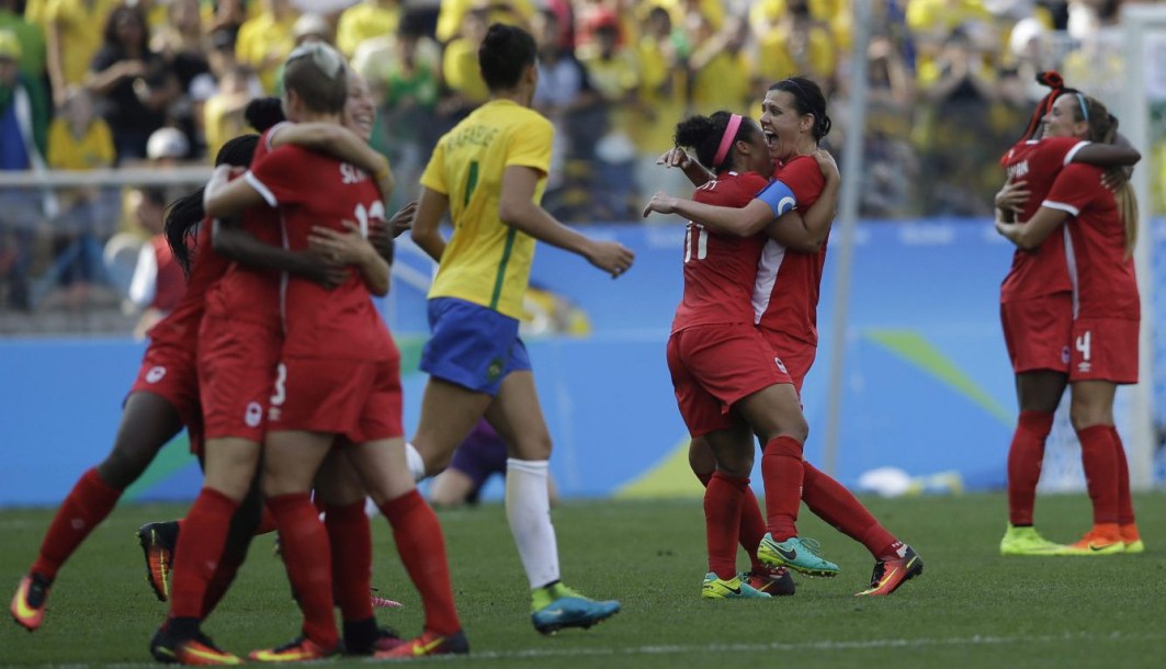 Canada players celebrate after beating Brazil 2-1 on the bronze medal match of the women's Olympic football tournament between Brazil and Canada at the Arena Corinthians stadium in Sao Paulo, Friday Aug. 19, 2016. (AP Photo/Nelson Antoine)
