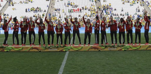 Canada team stands on the podium after winning the bronze medal in the women's Olympic football tournament between Brazil and Canada at the Arena Corinthians stadium in Sao Paulo, Friday Aug. 19, 2016. (AP Photo/Nelson Antoine)