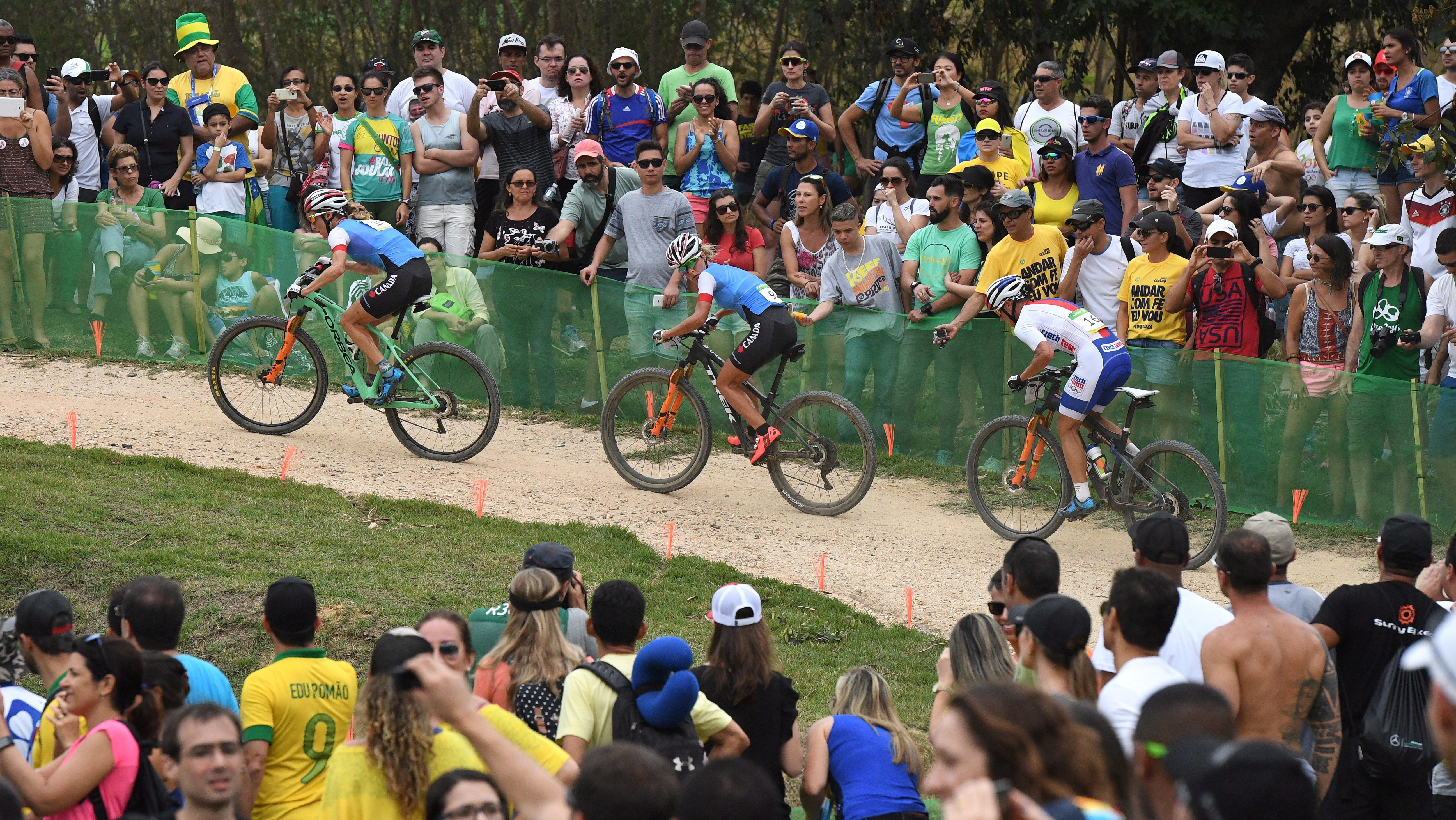 Canada's Catharine Pendrel, left to right, Emily Batty and Czech Replublic's Katerina Nash compete during the women's mountain bike final at the 2016 Olympic Summer Games in Rio de Janeiro, Brazil on Saturday, Aug. 20, 2016. THE CANADIAN PRESS/Sean Kilpatrick
