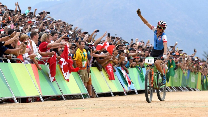 Canada's Catharine Pendrel celebrates bronze in the women's mountain bike final at the 2016 Olympic Summer Games in Rio de Janeiro, Brazil on Saturday, Aug. 20, 2016. THE CANADIAN PRESS/Sean Kilpatrick