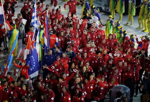 Athletes from Canada parade into the closing ceremony in the Maracana stadium at the 2016 Summer Olympics in Rio de Janeiro, Brazil, Sunday, Aug. 21, 2016. (AP Photo/Chris Carlson)