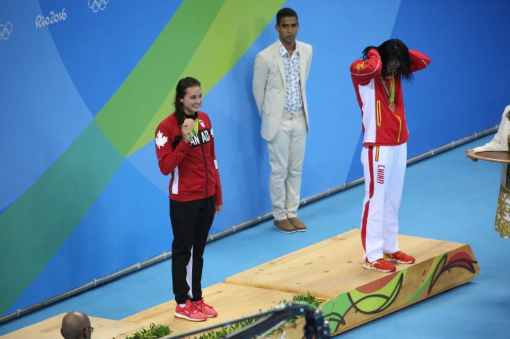 Canada's Kylie Masse being awarded her bronze medal after her 100m backstroke race on August 8, 2016