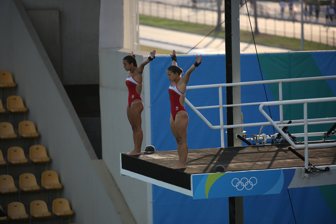 Canada's Meaghan Benfeito (left) and Roseline Filion perform in the women's synchronized 10-meter platform diving final at the 2016 Summer Olympics in Rio de Janeiro, Brazil, Tuesday, Aug. 9, 2016 