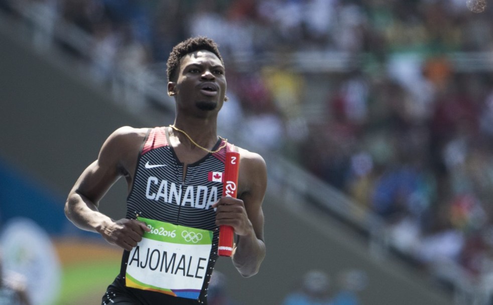 Mobolade Ajomale runs in the men's 4x100m relay qualifiers on August 18, 2016 during Rio 2016.