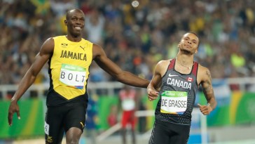 Bolt and De Grasse sprinting