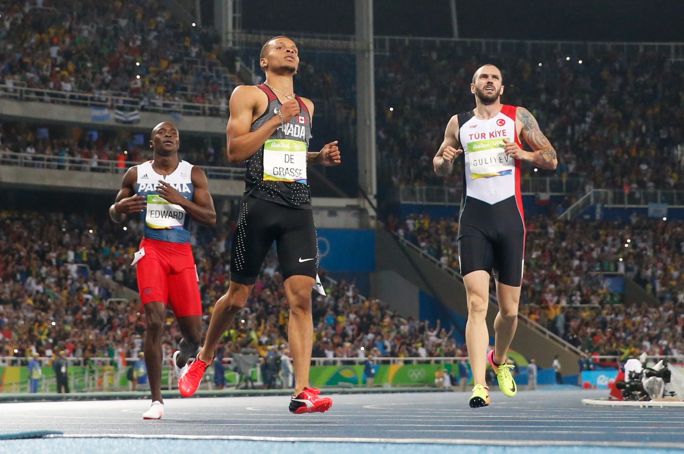 Andre De Grasse crossing the finish line in the men's 200-metre final at the 2016 Summer Olympics in Rio de Janeiro, Brazil on Thursday, August 18, 2016. (photo/ Mark Blinch)