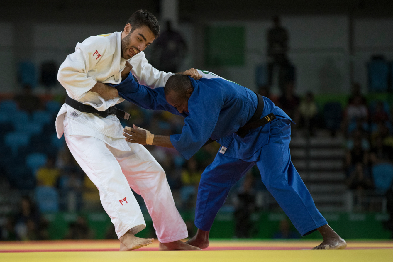Canada's Antoine Bouchard takes on Raymond Ovinou of Papua New Guinea during Men's 66kg Judo action at the Olympic games in Rio de Janeiro, Brazil, Sunday, August 7, 2016. COC Photo by Jason Ransom
