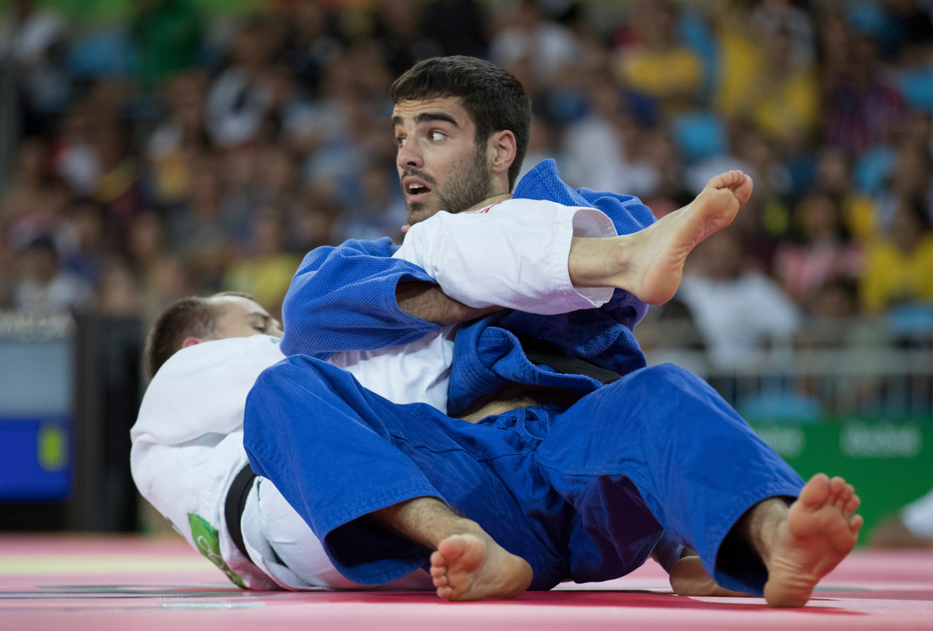 Canada's Antoine Bouchard takes on Mikhail Puliaev of Russia during Men's 66kg Judo, second-round action at the Olympic games in Rio de Janeiro, Brazil, Sunday, August 7, 2016. COC Photo by Jason Ransom