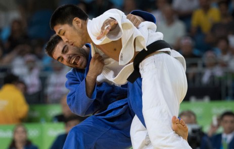 Canada's Antoine Bouchard battles with Tumurkhuleg Daaadorj of Mongolia for a spot in the bronze medal match in the Men's 66kg Judo compition at the Olympic games in Rio de Janeiro, Brazil, Sunday, August 7, 2016. Bouchard won the match and will advance. COC Photo by Jason Ransom