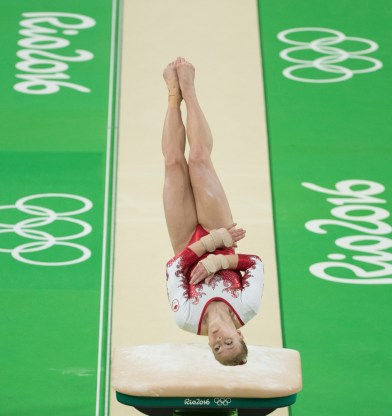 Canada's Brittany Rogers performs on the vault during the artistic gymnastics women's qualification at the 2016 Summer Olympics in Rio de Janeiro, Brazil, Sunday, Aug. 7, 2016.