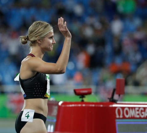 Canada's Brianne Theisen-Eaton, centre, following her bronze medal finish in the women's heptathlon at the 2016 Olympic Games in Rio de Janeiro, Brazil on Saturday, Aug. 13, 2016. (photo/ Jason Ransom)