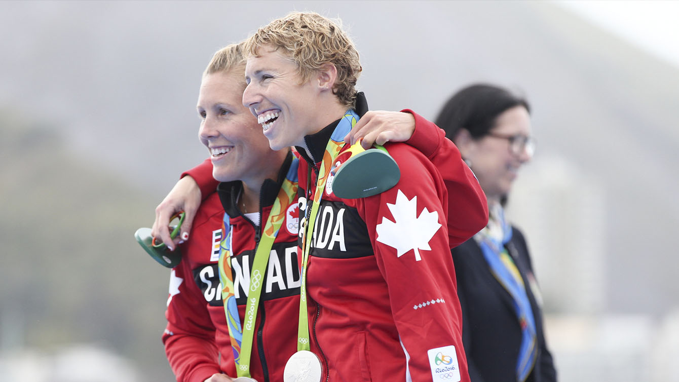 Patricia Obee and Lindsay Jennerich celebrate winning silver on Friday August 12, 2016 during lightweight women's double sculls.
