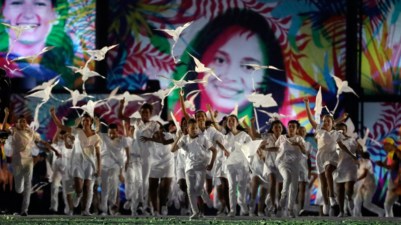 Children fly kites during the opening ceremony for the 2016 Summer Olympics in Rio de Janeiro, Brazil, Friday, Aug. 5, 2016. (AP Photo/David J. Phillip)