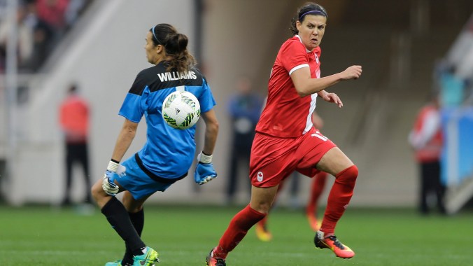 Sinclair Canada's Christine Sinclair, right, dribbles past the Australia goalkeeper Lydia Williams, on his way to score her team's 2nd goal, during the 2016 Summer Olympics football match between Canada and Australia, at the Arena Corinthians, in Sao Paulo, Brazil, Wednesday, Aug. 3, 2016. Canada won 2-0. (AP Photo/Nelson Antoine)